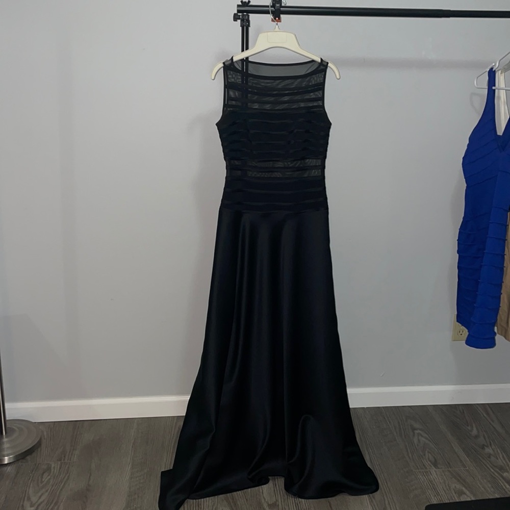Black elegant long silk dress with sheer top portions